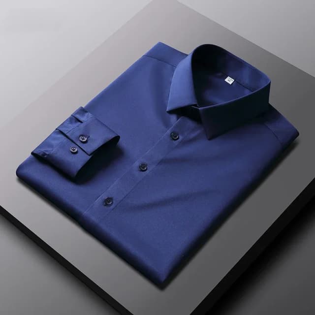 Nueva camisa informal de negocios de manga larga de Color sólido para hombre, resistente a las arrugas, cómoda, versátil para todas las estaciones
