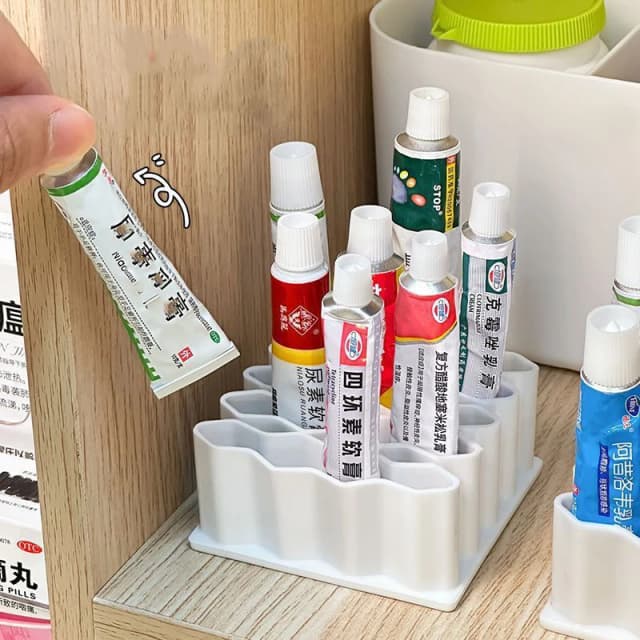 Soporte para ungüentos de escritorio, soporte para ungüentos de material de silicona, estante de almacenamiento de cosméticos, soporte para bolígrafos, organizador de compartimentos para ungüentos para el hogar