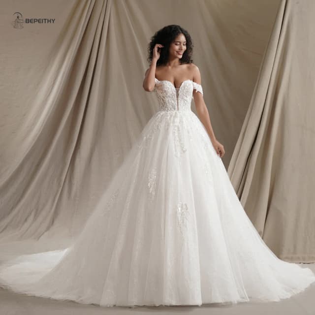 BEPEITHY-vestidos de Boda de Princesa con purpurina y escote en forma de corazón personalizados para mujer, vestido de novia sin mangas de color marfil con hombros descubiertos 2024